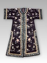 A Blue ground Lady's Robe embroidered with Butterflies, c.1900,