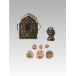 Six moulded Pottery Tsa Tsa, Qing dynasty, A Miniature Bronze seated Bodhisattvas, and a copper Gau,