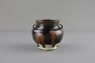 A Cizhou Russet-splashed Black-glazed Handled Jar, Song dynasty