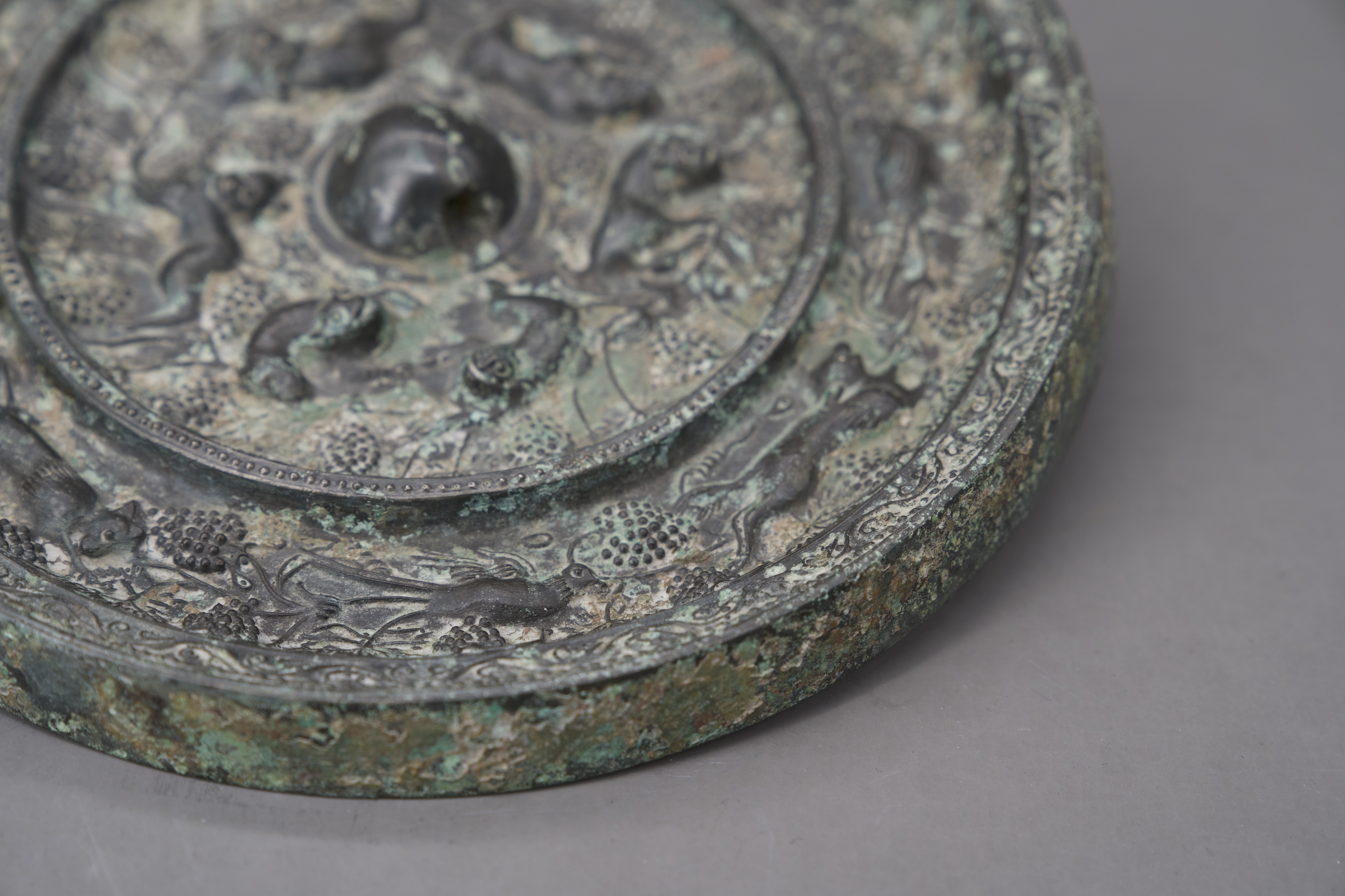 A Bronze 'lion and grapevine' Mirror,possibly Tang - Image 7 of 9