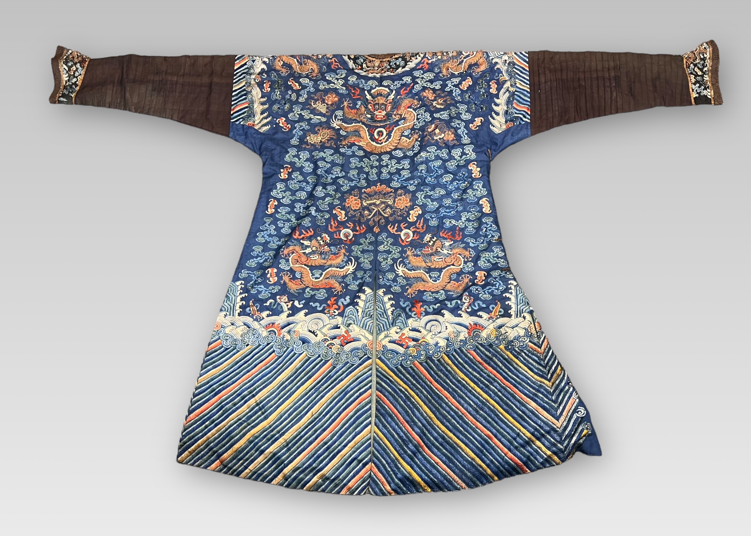 A Blue ground Embroidered Nine Dragon Robe, Jifu, c. 1900, - Image 2 of 3