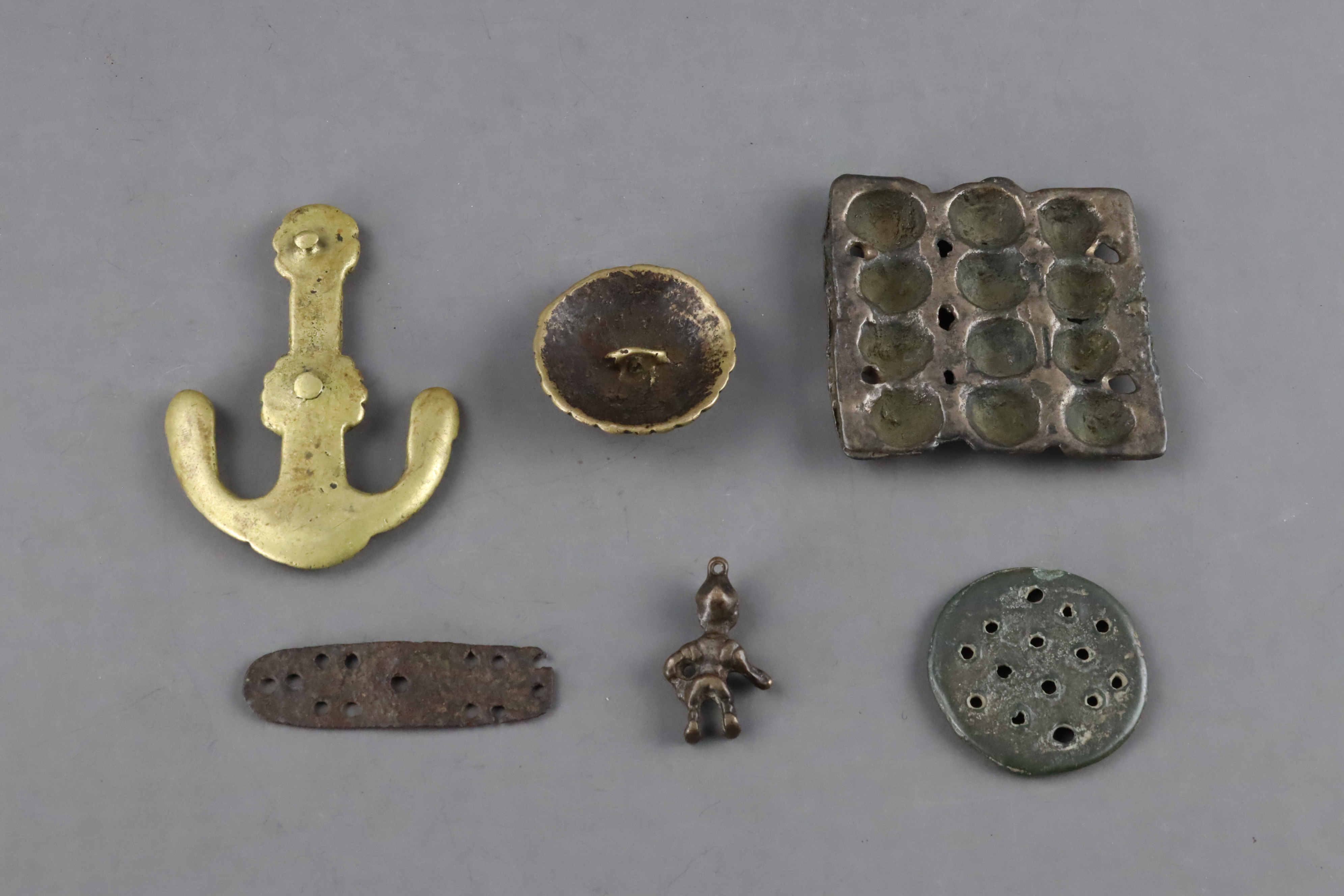 Six Small Bronze or Iron Objects, mainly Tibetan, 19th century and earlier,