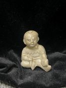 A Ding-type White-glazed Figure of a Child, Song/Jin dynasty