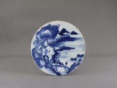 A Blue and White Circular Landscape Plaque, 19th century,