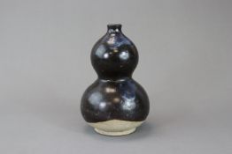 A Phosphatic-splashed Double-gourd Vase, Tang dynasty