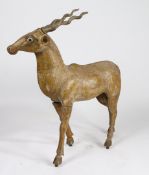 AN INDIAN PAINTED CARVED WOOD MODEL OF A BLACKBUCK/ANTELOPE.