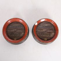 A PAIR OF GUINNESS STOUT ASHTRAYS.