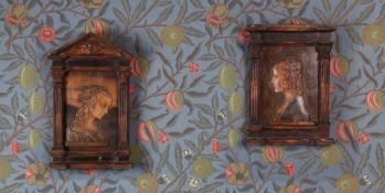 A NEAR PAIR OF 16TH CENTURY STYLE PLASTER PANELS.