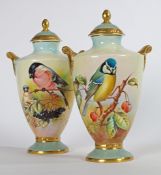 A PAIR OF AYNSLEY 'FINE ART COLLECTION' PORCELAIN, TWIN HANDLED LIDDED VASES.