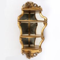 A 19TH CENTURY GILT CORNER MIRROR.