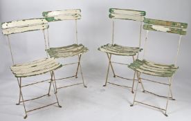 FOUR FRENCH FOLDING PATIO CHAIRS.