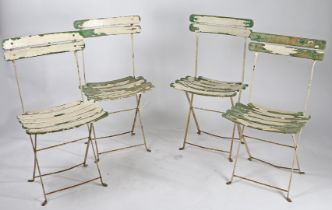FOUR FRENCH FOLDING PATIO CHAIRS.