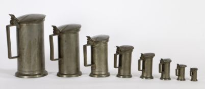 A SET OF EIGHT GRADUATED LIDDED PEWTER MEASURES BY MAISON LESEIGNEUR. CAEN.