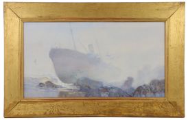 FRANK SOUTHGATE, RBA (BRITISH,1872-1916) ON THE ROCKS - SHIPWRECK OFF A COAST.