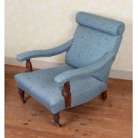 A HOWARD AND SONS TYPE ARMCHAIR.