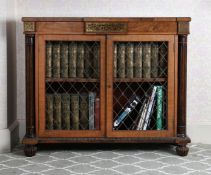 A REGENCY STYLE ROSEWOOD AND MAHOGANY CABINET.