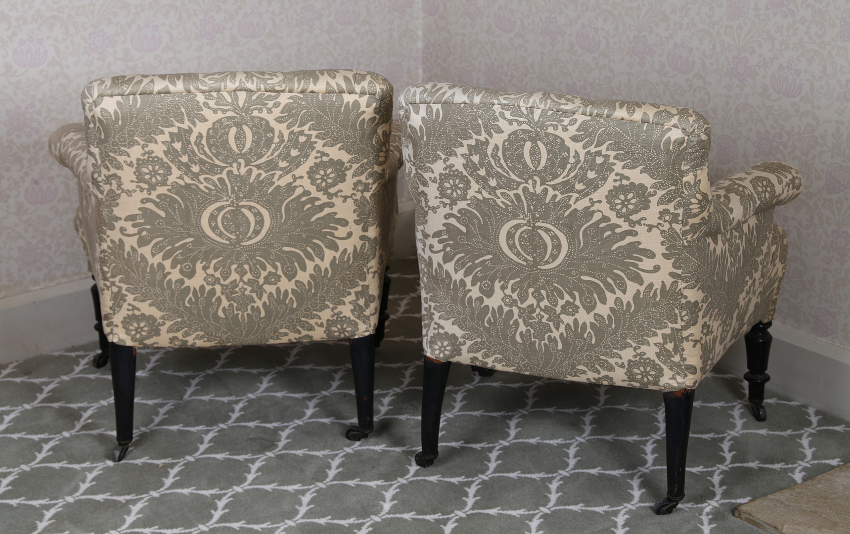 A PAIR OF LATE VICTORIAN LOW ARMCHAIRS. - Image 2 of 2