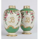 A PAIR OF RARE 18TH CENTURY WORCESTER OVAL TEA CANISTERS, HAND PAINTED WITH ONGLAZE COLOURS.