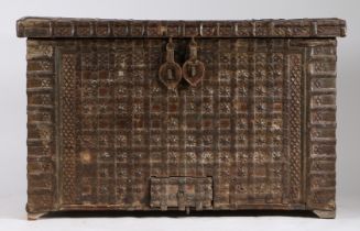 AN INDIAN TEAK AND IRON BOUND CHEST.