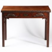 AN EARLY GEORGE III CARVED MAHOGANY CARD TABLE.