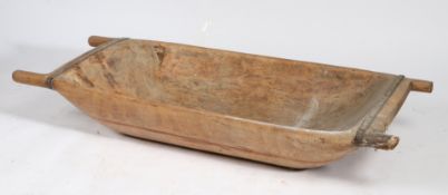 A 19TH CENTURY WOODEN AND METAL BANDED DOUGH TROUGH.