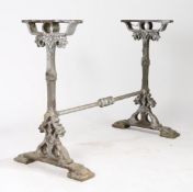 A VICTORIAN CAST IRON GARDEN TABLE BASE.