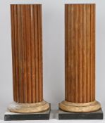 A PAIR OF PINE PEDESTALS.