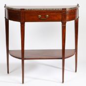 A 19TH CENTURY FRENCH MAHOGANY AND BRASS STRUNG CONSOLE TABLE.