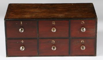 A VICTORIAN BANK OF SIX APOTHECARY DRAWERS.