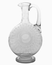 A VICTORIAN ENGLISH GLASS CLARET JUG.