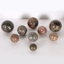 A COLLECTION OF MARBLE AND STONE SPHERES.