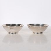 A PAIR OF GEORGE V BRITANNIA STANDARD SILVER BOWLS.