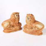 A PAIR OF VICTORIAN STAFFORDSHIRE LIONS.