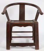 A CHINESE QING DYNASTY HORSESHOE CHAIR.