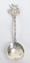 AN UNUSUAL SILVER NATURALISTIC CADDY SPOON. TWISTED STEM WITH FINIAL MODELLED AS A BIRD ATOP A NEST.