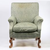 HOWARD & SONS, A VICTORIAN DEEP ARMCHAIR.