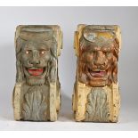 A PAIR OF SUBSTANTIAL POLYCHROME PAINTED CORBELS.