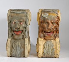 A PAIR OF SUBSTANTIAL POLYCHROME PAINTED CORBELS.