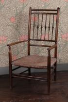 A LATE 19TH CENTURY LIBERTY & CO. ARMCHAIR