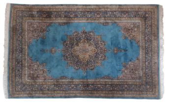 A LARGE PERSIAN RUG.