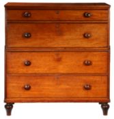 A 19TH CENTURY MAHOGANY CAMPAIGN CHEST OF DRAWERS.