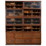 A LARGE EARLY 20TH CENTURY OAK HABERDASHERY CABINET.