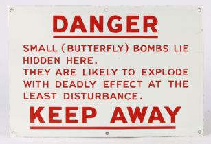 'DANGER BUTTERFLY BOMBS LIE HIDDEN HERE' WWII WARNING SIGN.