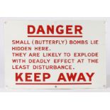'DANGER BUTTERFLY BOMBS LIE HIDDEN HERE' WWII WARNING SIGN.