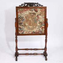 A VICTORIAN MAHOGANY FIRESCREEN.