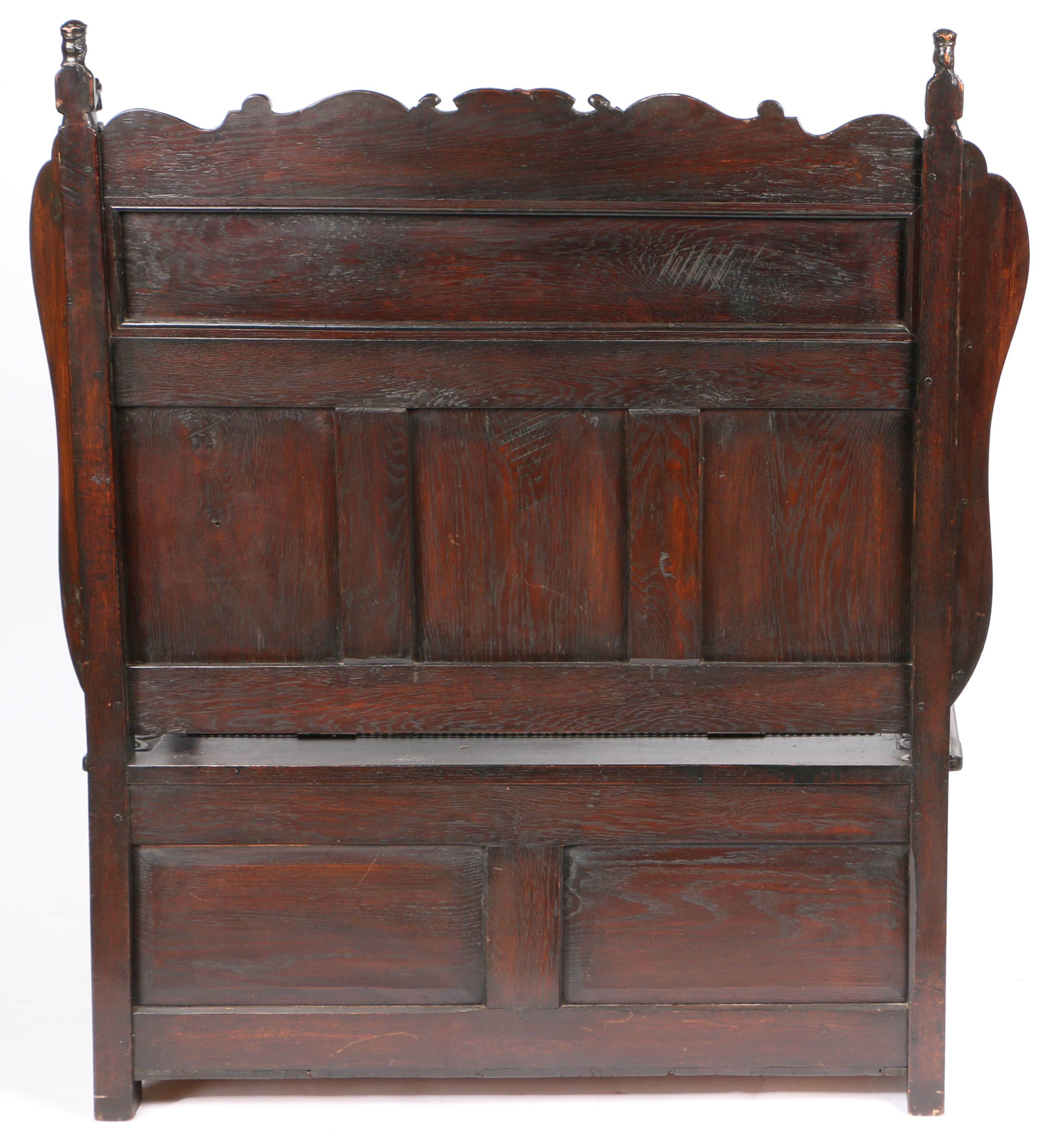 A 19TH CENTURY OAK SETTLE IN THE 17TH CENTURY MANNER. - Image 4 of 4