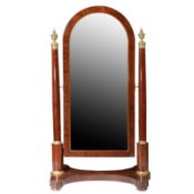 A FRENCH EMPIRE MAHOGANY AND ORMOLU MOUNTED CHEVAL MIRROR.