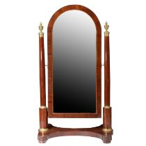 A FRENCH EMPIRE MAHOGANY AND ORMOLU MOUNTED CHEVAL MIRROR.