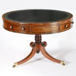 A REGENCY MAHOGANY DRUM TABLE.