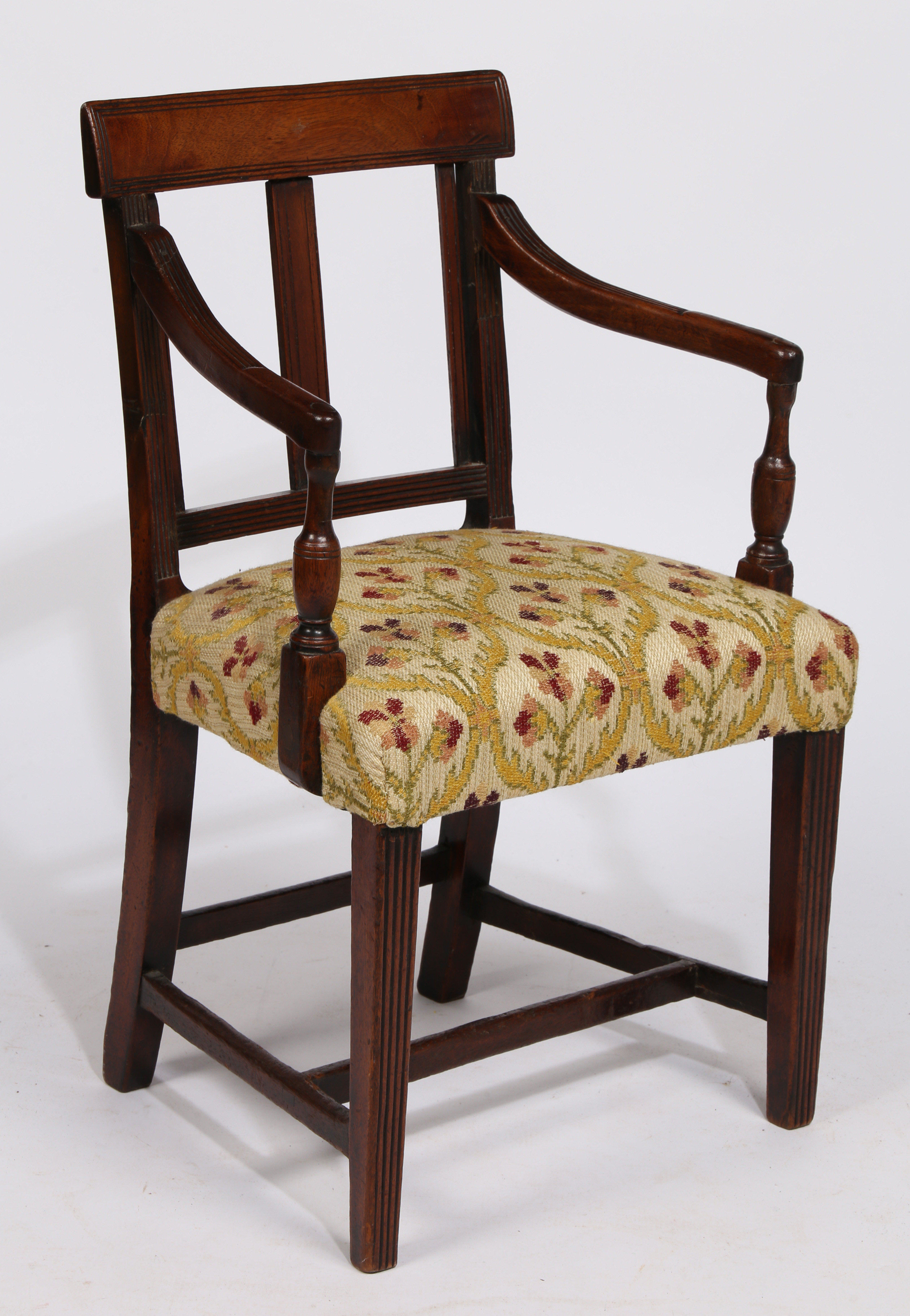 A REGENCY MAHOGANY CHILDS ARMCHAIR.